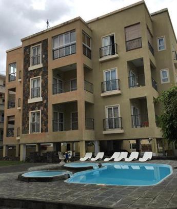Flic-en-Flac Apartment | Relax at Rayons Vert Complex with Pool Access in Flic en Flac