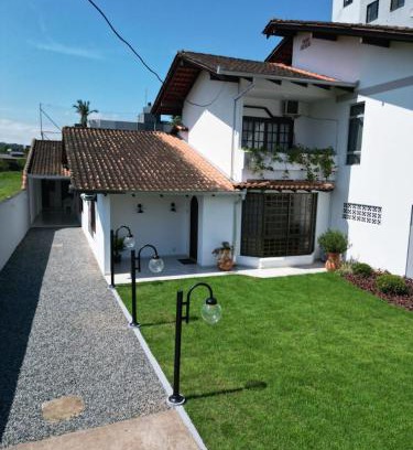 Joinville House | RCM Vilas - Family-Friendly Retreat with Pet Amenities