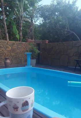Morrinhos House | Enchanting Recanto dos Pássaros with Ocean View & Pool