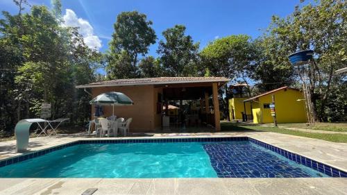 Pirenopolis House | Discover Recanto Luz: Oceanfront Retreat with Pool Access