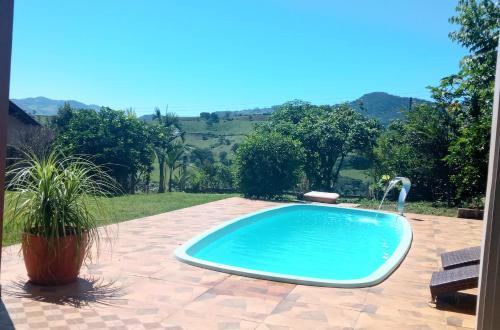 Socorro House | Relax at Recanto São Gabriel with Ocean Views & Pool