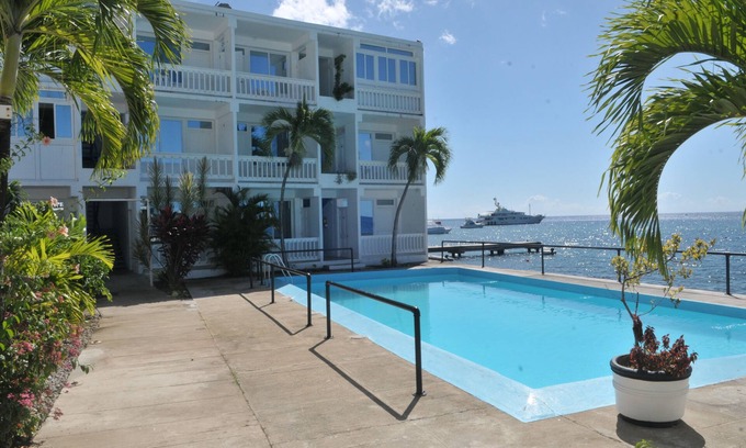 Castle Comfort Hotel | Renovated Poolfront Hotel Near Roseau with Spa & Ocean Views