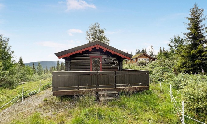 Nordre Land House | Unwind in a Cozy Log Cabin by the Serene Synna River