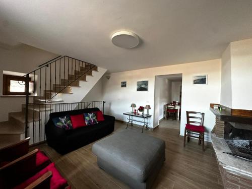 Lucoli House | Inviting Red Cottage-Campo Felice: Pet-Friendly Escape
