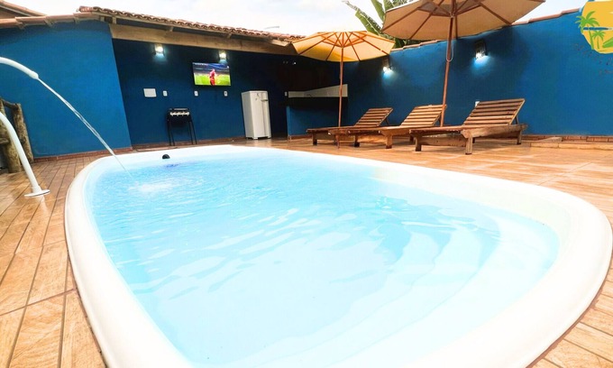 Corumbau House | Relax at Red Macaw: Pet-Friendly Oasis with Pool & Beach Access