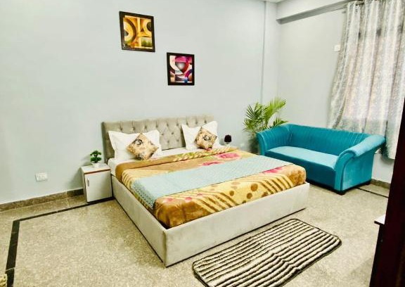 Noida Villa | Inviting Red Velvet Hotel with Sunshine Views & Pet-Friendly