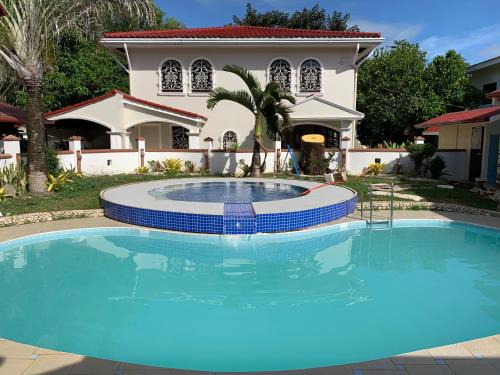 Masbate City Hotel | Family-Friendly RedDoorz at Carlton-Martin in Masbate City