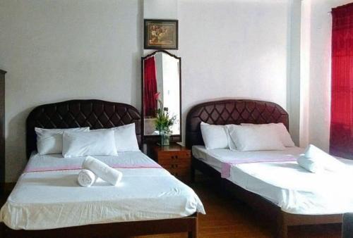 Canloan City Hotel | Discover Comfort at RedDoorz RHR Tourist Inn Canlaon