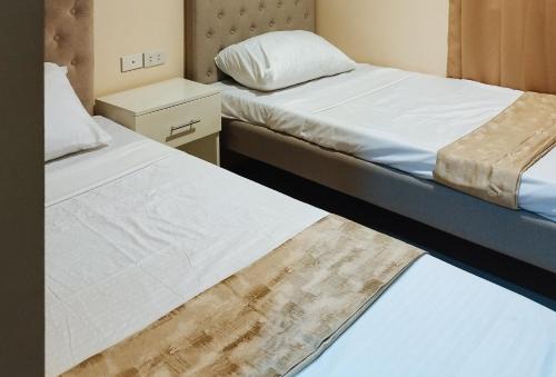 Pavia Hotel | Budget-Friendly Stay at RedDoorz @ Benelio Suites Pavia