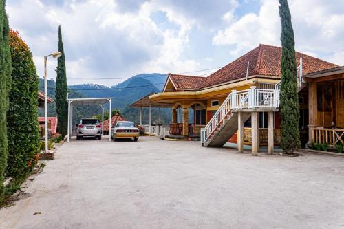 Rancabali House | Cozy RedDoorz Retreat Near Kawah Putih Ciwidey