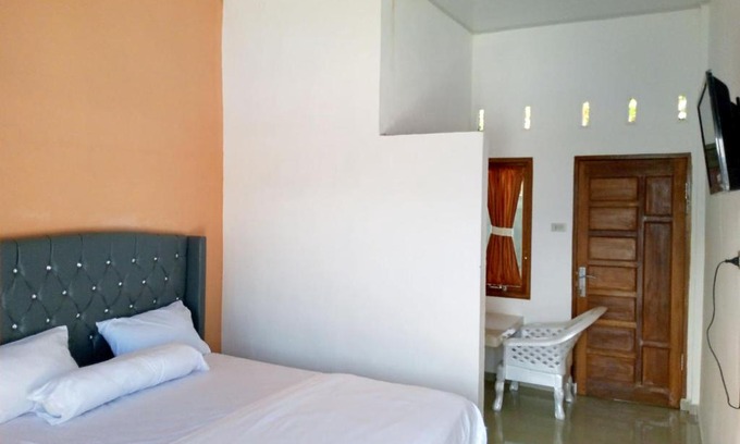 Ambarita Hotel | Budget-Friendly Stay at RedDoorz @ Sihole Paradise Inn