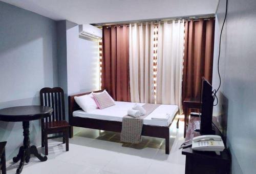 Vigan Hotel | Family-Friendly Stay at RedDoorz @ Villa E Mansion