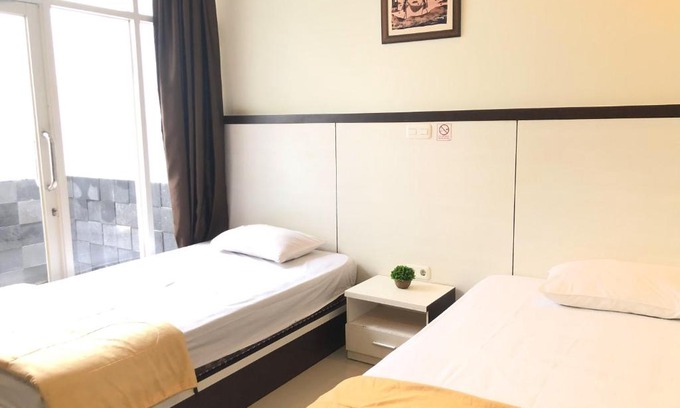 Palu Hotel | Family-Friendly Stay at RedDooz Plus Ininnawa Homestay