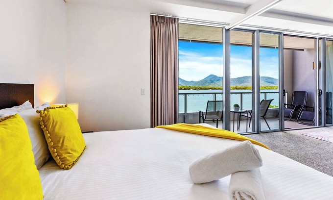 Cairns Central Business District Apartment | Reef: Waterfront Retreat with Pool, Sauna & Ocean Views