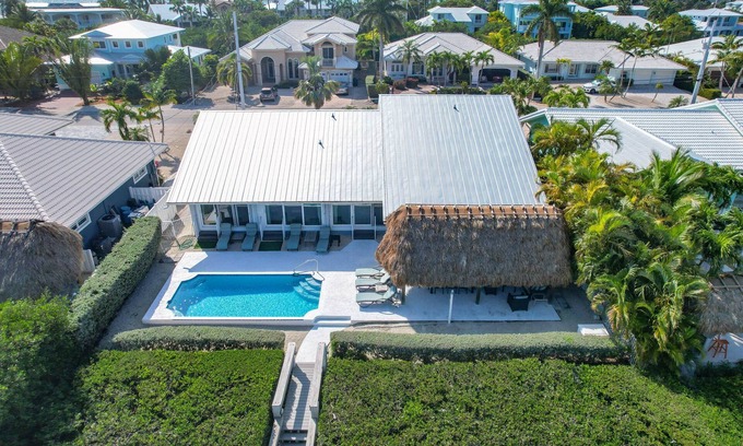 Coury House | Discover Your Perfect KCB Retreat with Private Pool & Dock