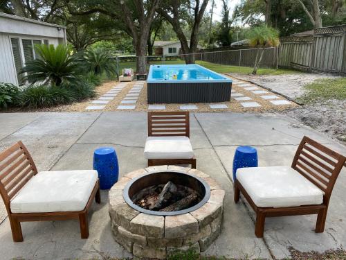 Bearss Plaza House | Relaxing Riverfront Retreat with Huge 24ft Swim Spa