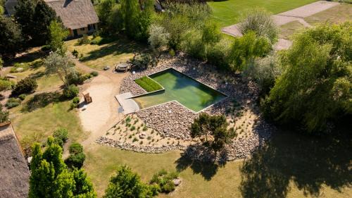 Krienke House | Cozy Reetdachhaus with Pool and Ocean View in Krienke