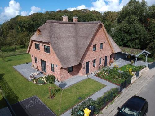 Eiderstedt House | Experience Family-Friendly Comfort at Reetdachhaus Nordstern