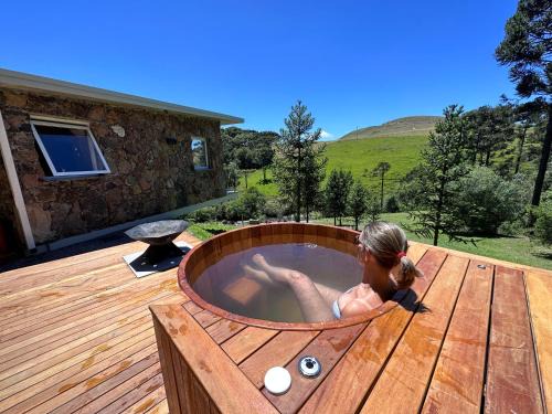 Cambara do Sul Villa | Elegant Stay at Refúgio Casa de Pedra with Hot Tub Perks