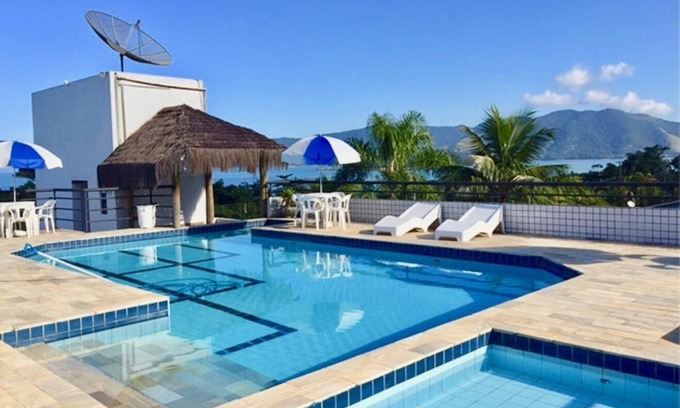 Lagoinha Apartment | Unwind at Kendy Flats: Rooftop Pool & Ocean Views