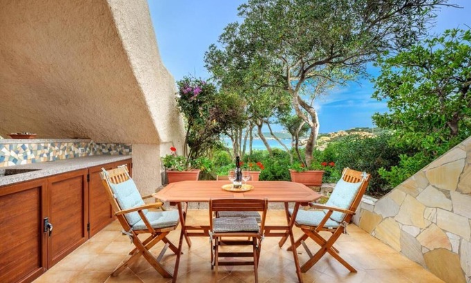 Santa Reparata Apartment | Beachfront Retreat with Pool and Ocean View Amenities