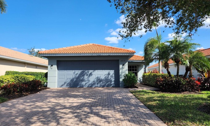 Cascades House | Inviting Lake View Retreat in Upscale Estero Community