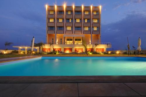 Vagra Resort | Explore Regenta Central Hestia Dahej with Pool & Family Fun
