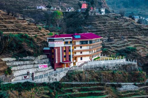 Ukhimath Hotel | Discover Regenta Resort Madhuganga: Family-Friendly Retreat