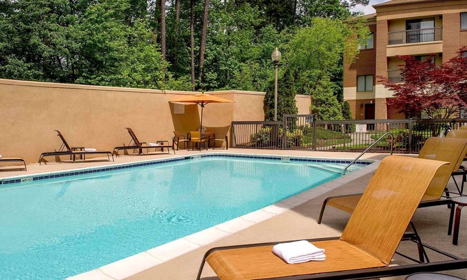 Durham Hotel | Relax and Recharge: Comfortable Units with Onsite Pool