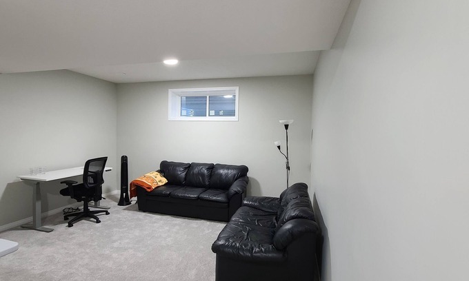 Airdrie House | Indulge in Relaxation with Spa and Hot Tub Amenities