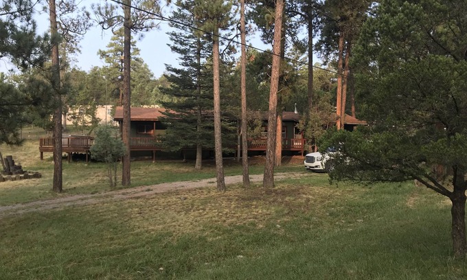 Ruidoso House | Relax and Unwind on Expansive Decks Amid Pine Trees