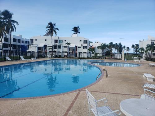 Zarzal Apartment | Beachfront Relaxation: Rated 9.6 with Private Pool & Beach
