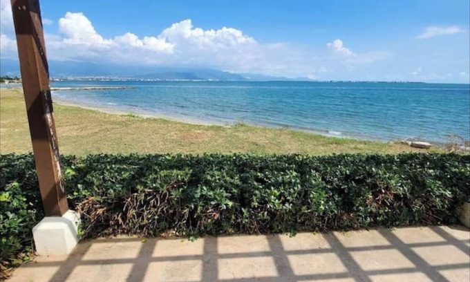 Portmore Villa | Relax by the pool with the sounds of waves and enjoy ocean and mountains views