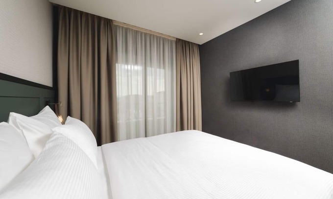 Podgorica Hotel | Relax in Spacious Room w/Balcony, City view & Free Parking in Prime location!