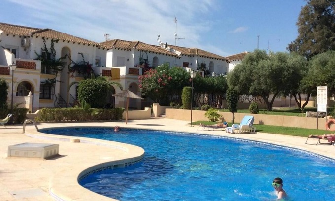 San Miguel de Salinas Apartment | Unwind Under the Sun at Villamartin with Ocean Views