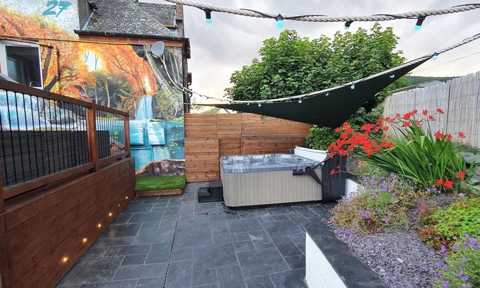 Walkerburn House | Relax in this luxury renovated flat with a hot tub and log burner