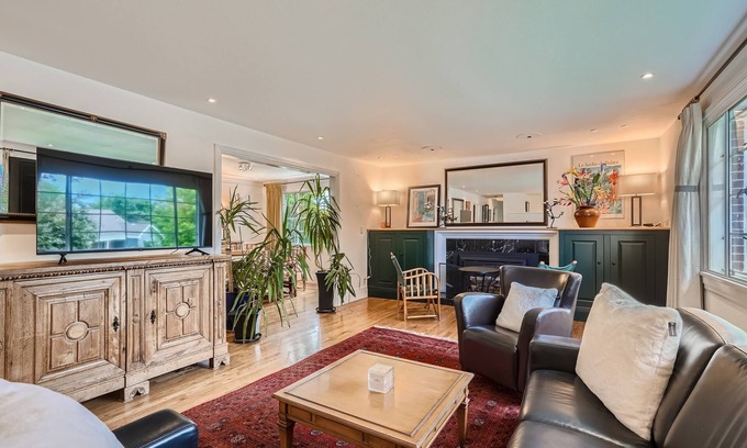 Park East House | Charming Cozy Home with Fireplace, Yard, and Fun Amenities