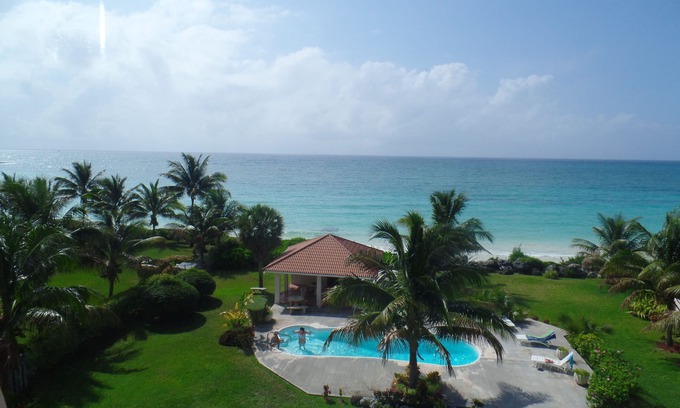 Williams Town Condo | Soothing Oceanfront Retreat with Pool and Spa Amenities