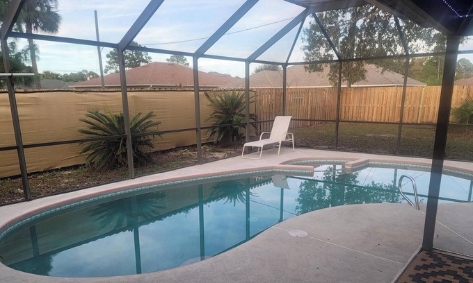 Palm Bay House | Relax with your family and friends at this spacious and private pool home.