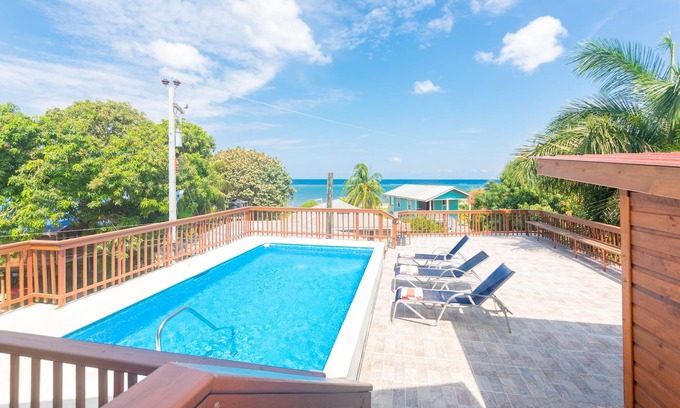 Sandy Bay Apartment | Serene Family Retreat with Pool and Spa Amenities