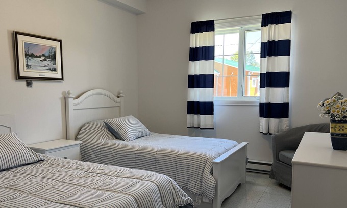 Saint-Marc-du-Lac-Long Apartment | Relaxing Getaway with Breathtaking Lake Views and More