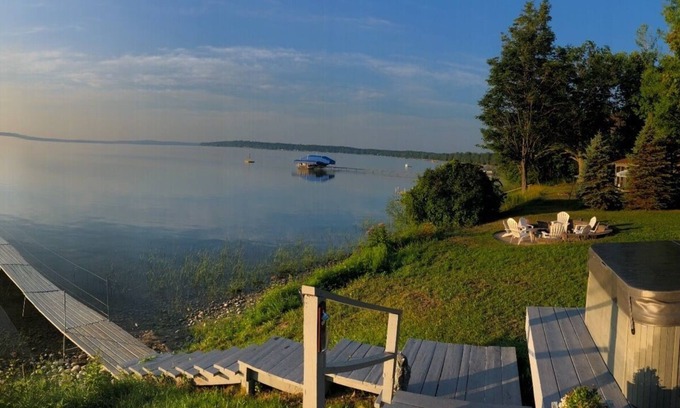Brutus House | Tranquil Burt Lake Cottage with Pool & Scenic Views
