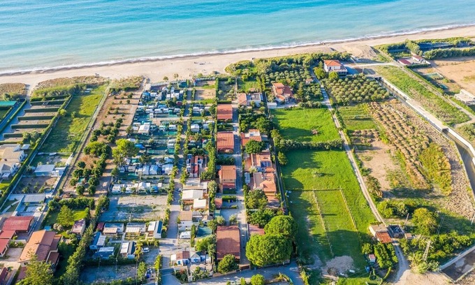 Piana Calzata Villa | Cozy Villa Steps from the Beach with Ocean View & Kitchen
