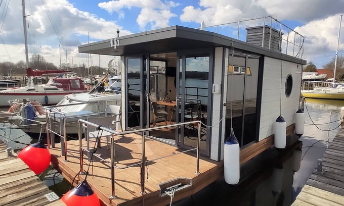 Schleswig Boat Rental | Peaceful Houseboat Hilja with Ocean View & Pet-Friendly Amenities