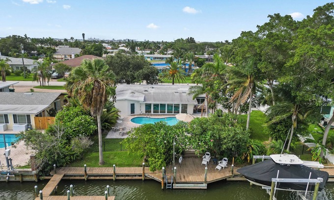 Venetian Way House | Unforgettable Riverfront Home with Pool and Dock in Cocoa Beach