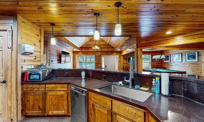 Bentonville Cabin | Inviting Two-Story Cabin with Full Kitchen & Deck Awaits