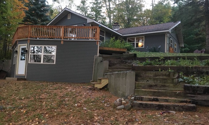 Iron River Cabin | Secluded Wilderness Retreat with Private Lake & Spa Amenities