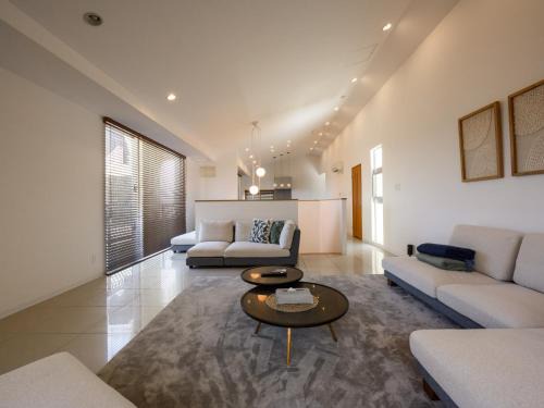 Maeda Villa | Oceanfront Bliss at ReN OKINAWA: Perfect for Families