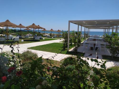 Mondragone Resort | Beautiful Rena Resort: Oceanfront Oasis with Private Beach