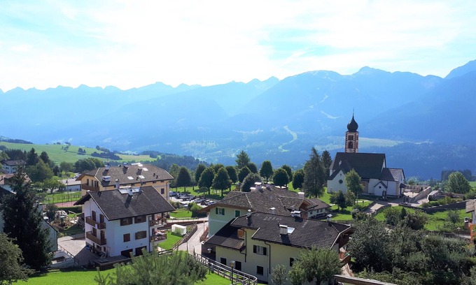Daiano Apartment | Scenic Flat with Breathtaking Views in the Dolomites